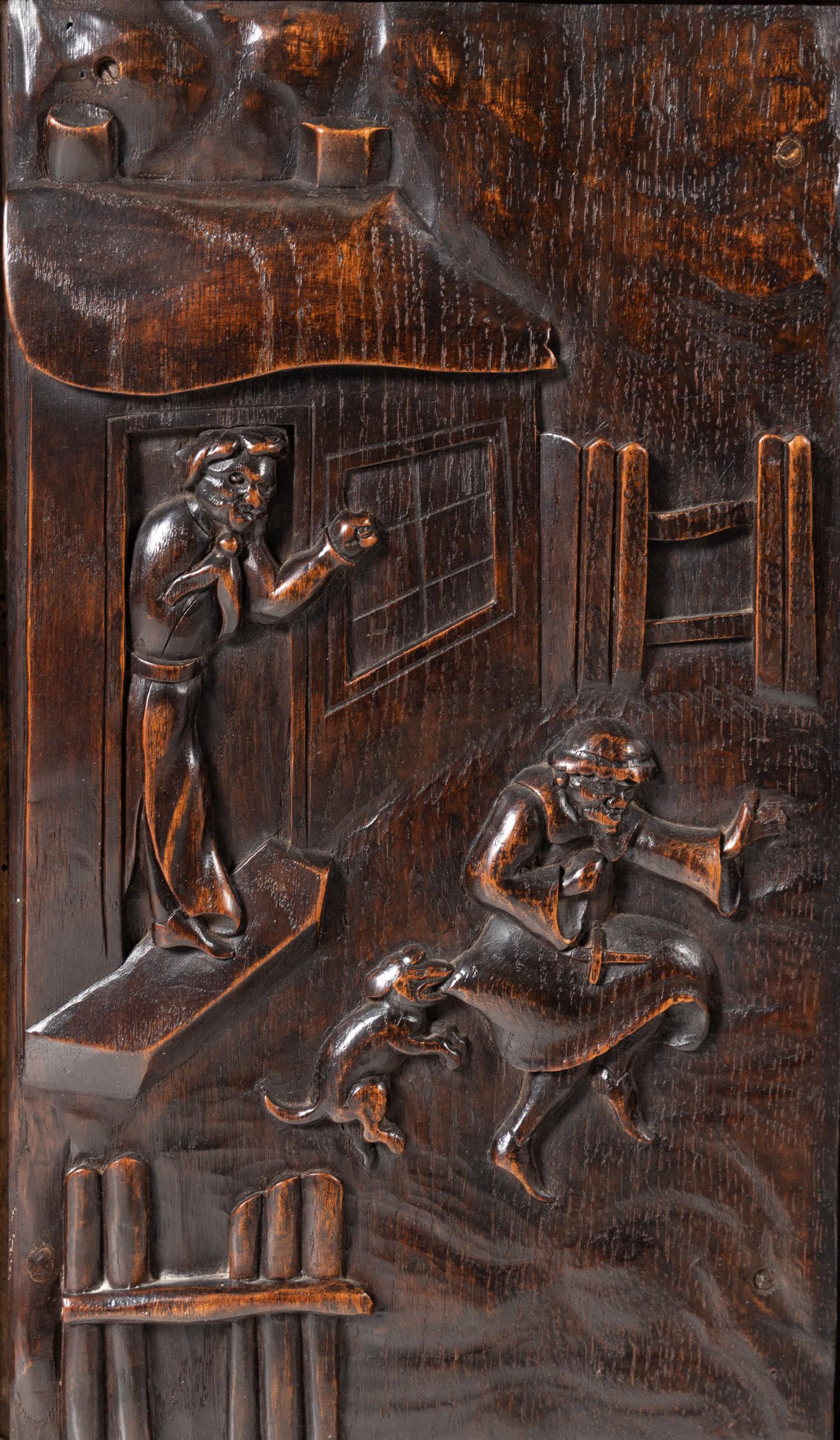 A Continental Carved Oak Wardrobe Cabinet