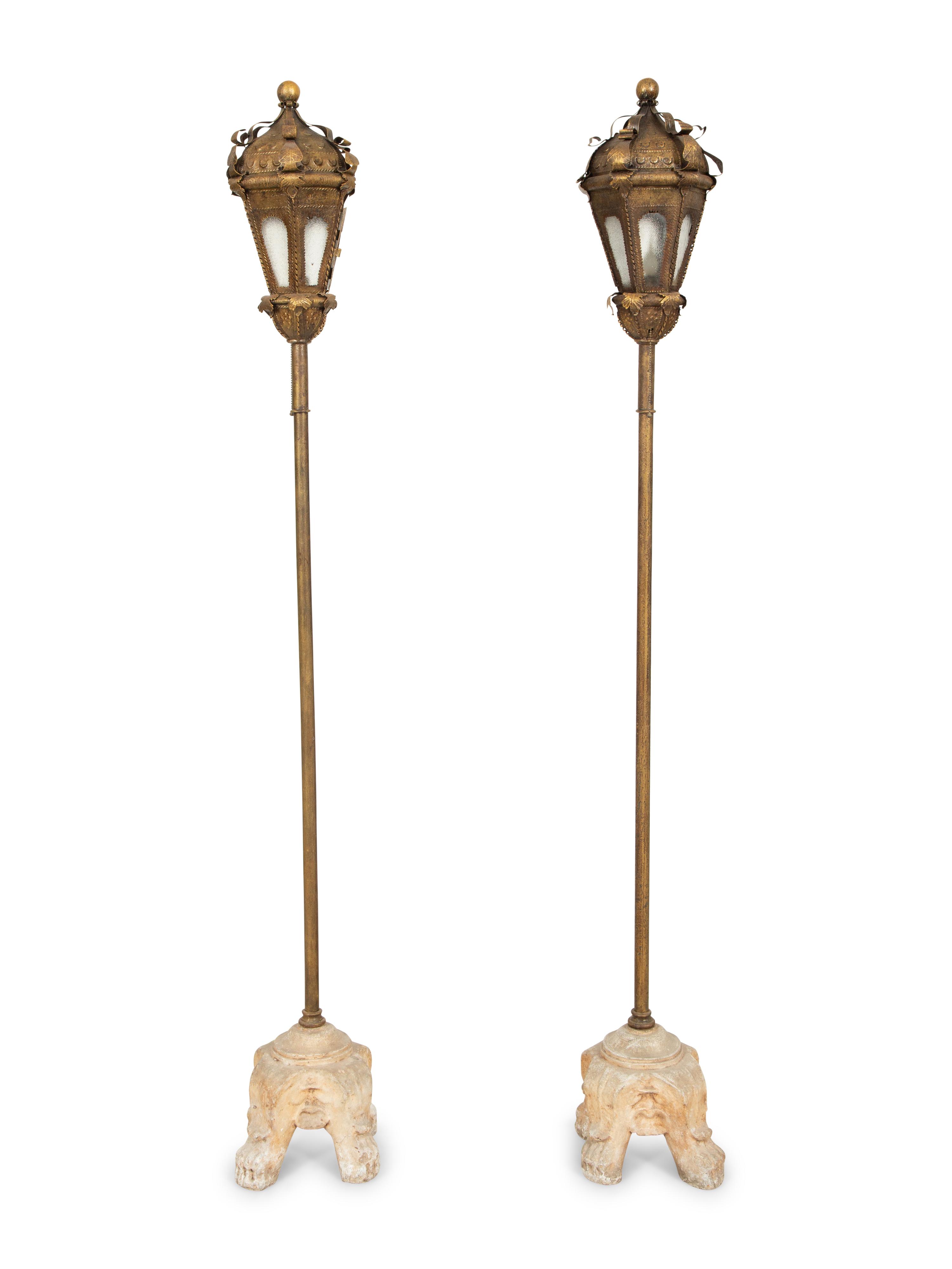A Pair of Gondola Style Stamped Brass Floor Lamps