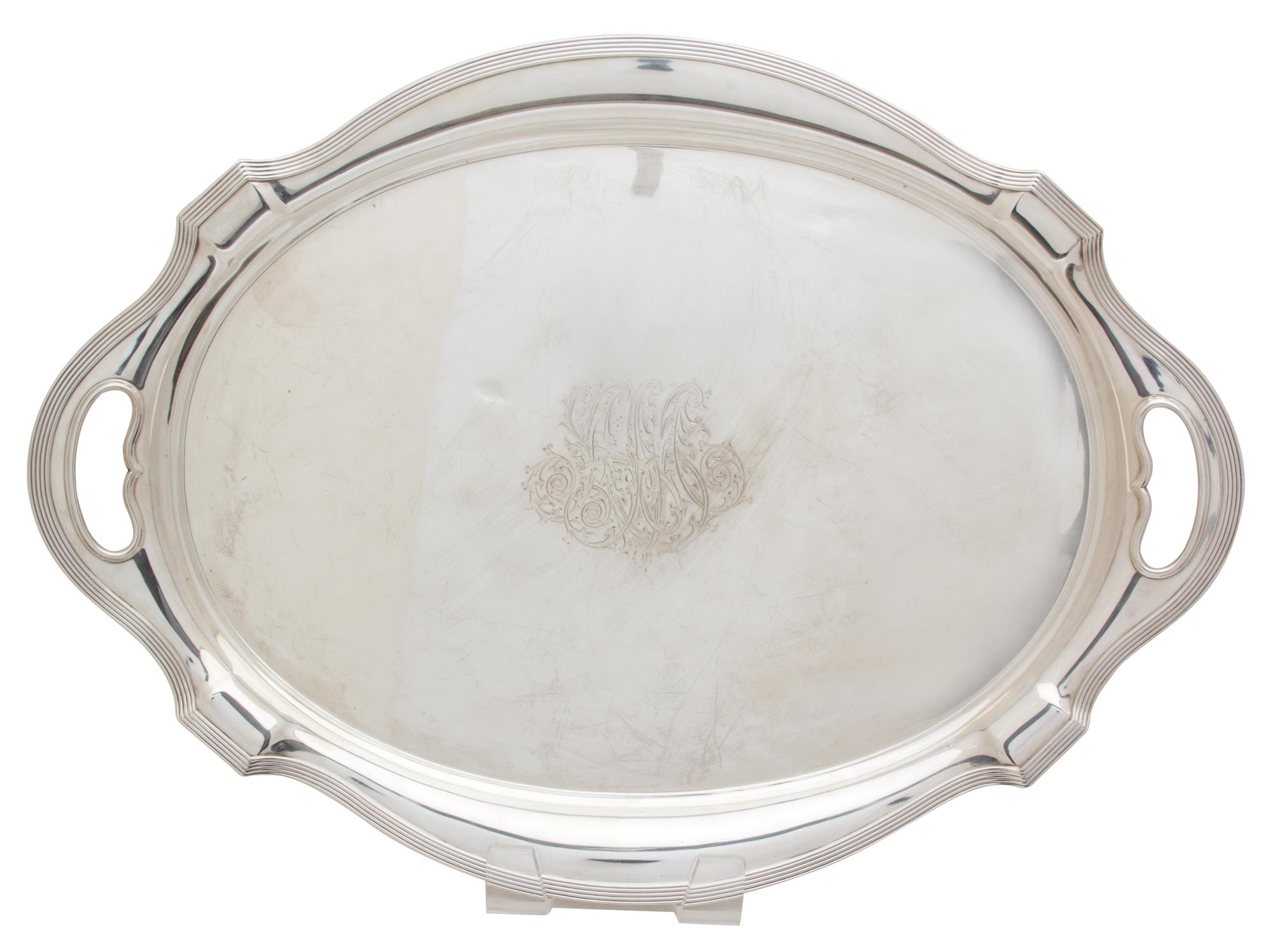 An American Silver Serving Tray, Gorham Mfg. Co., Providence, RI, having a reeded border, cut out handles and monogrammed.