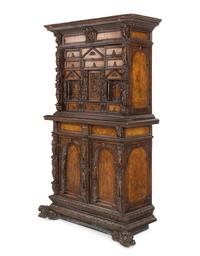An Italian Renaissance Style Walnut Cabinet