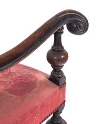A Pair of William and Mary Style Carved Walnut Armchairs