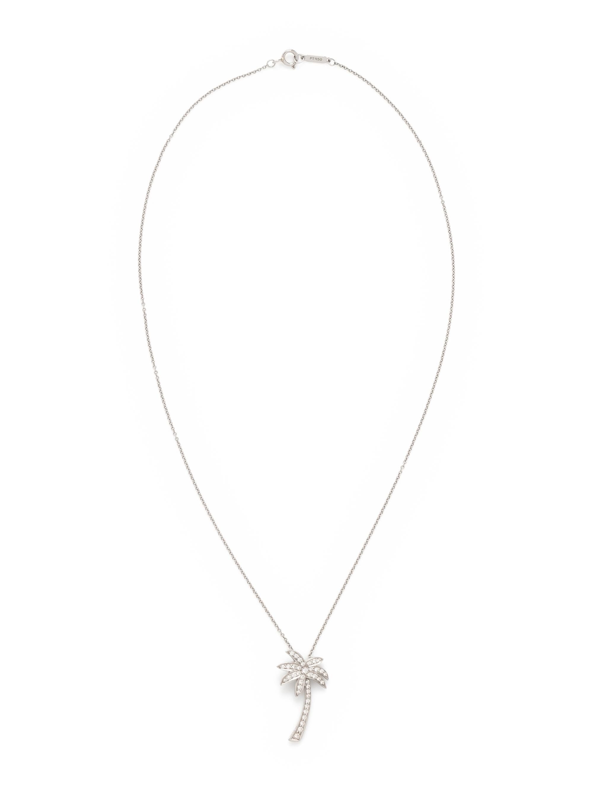 TIFFANY & CO., PLATINUM AND DIAMOND PALM TREE PENDANT/NECKLACE