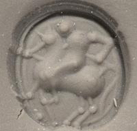 An Etruscan Carnelian Scarab with a Rider on Horseback
