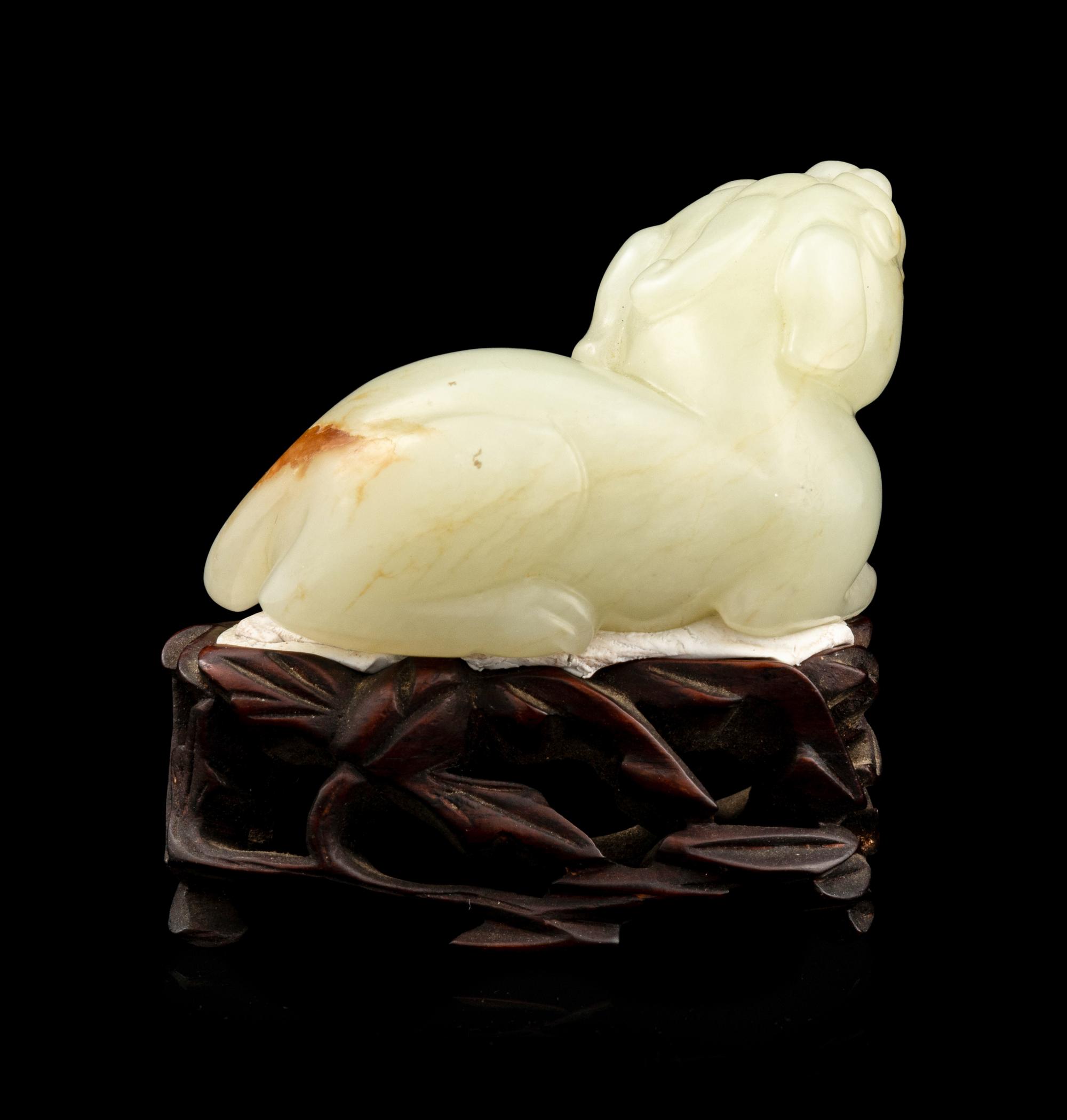A Carved Russet and White Jade Figure of Mythical Beast, Tianlu