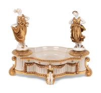 An Assortment of Porcelain and Bronze Figures