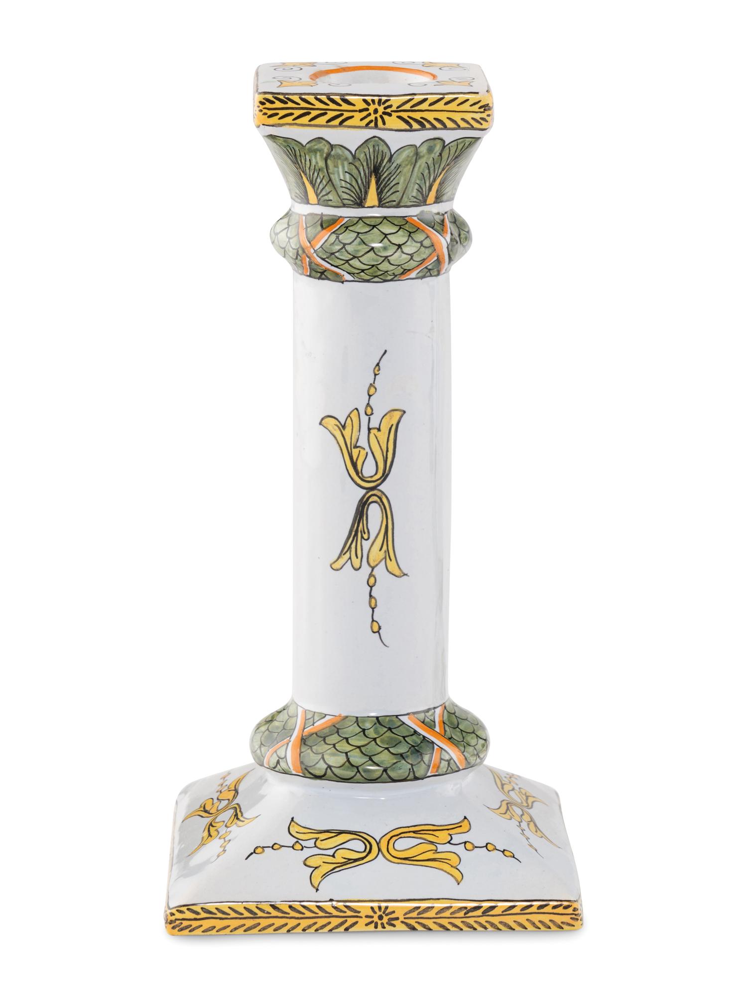 A Set of Four French Faience Candlesticks