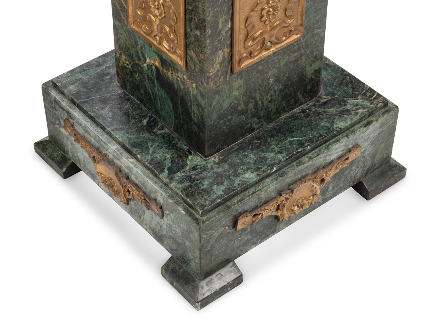 A Pair of Continental Gilt Bronze Mounted Marble Pedestals