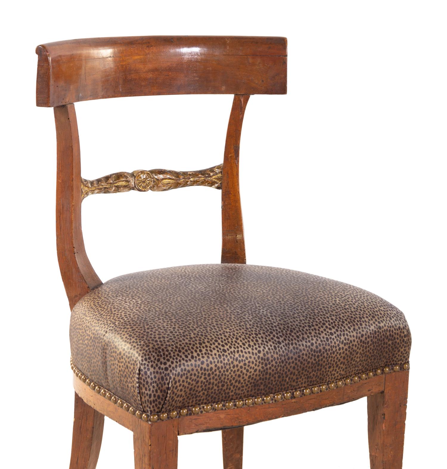 A Pair of Regency Parcel-Gilt Side Chairs
