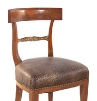 A Pair of Regency Parcel-Gilt Side Chairs