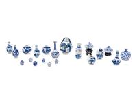 Twenty Small Blue and White Porcelain Vessels