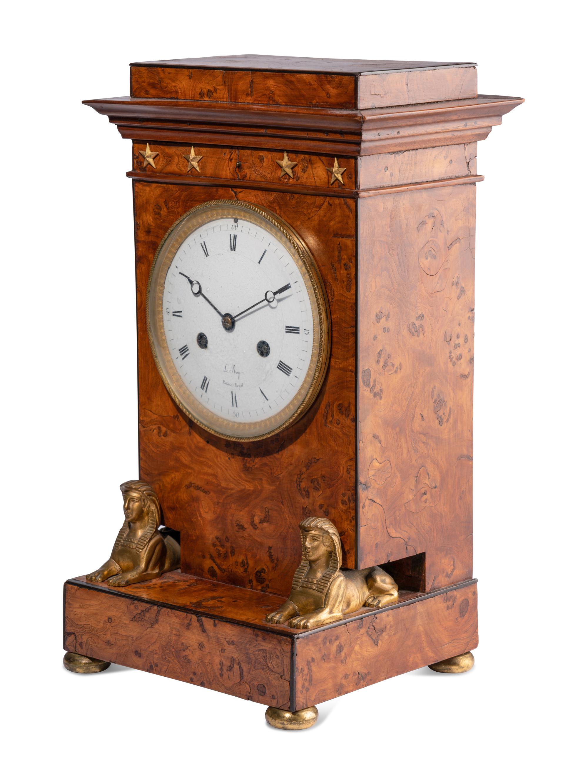 An Empire Burr Elm and Ormolu-Mounted Mantel Clock