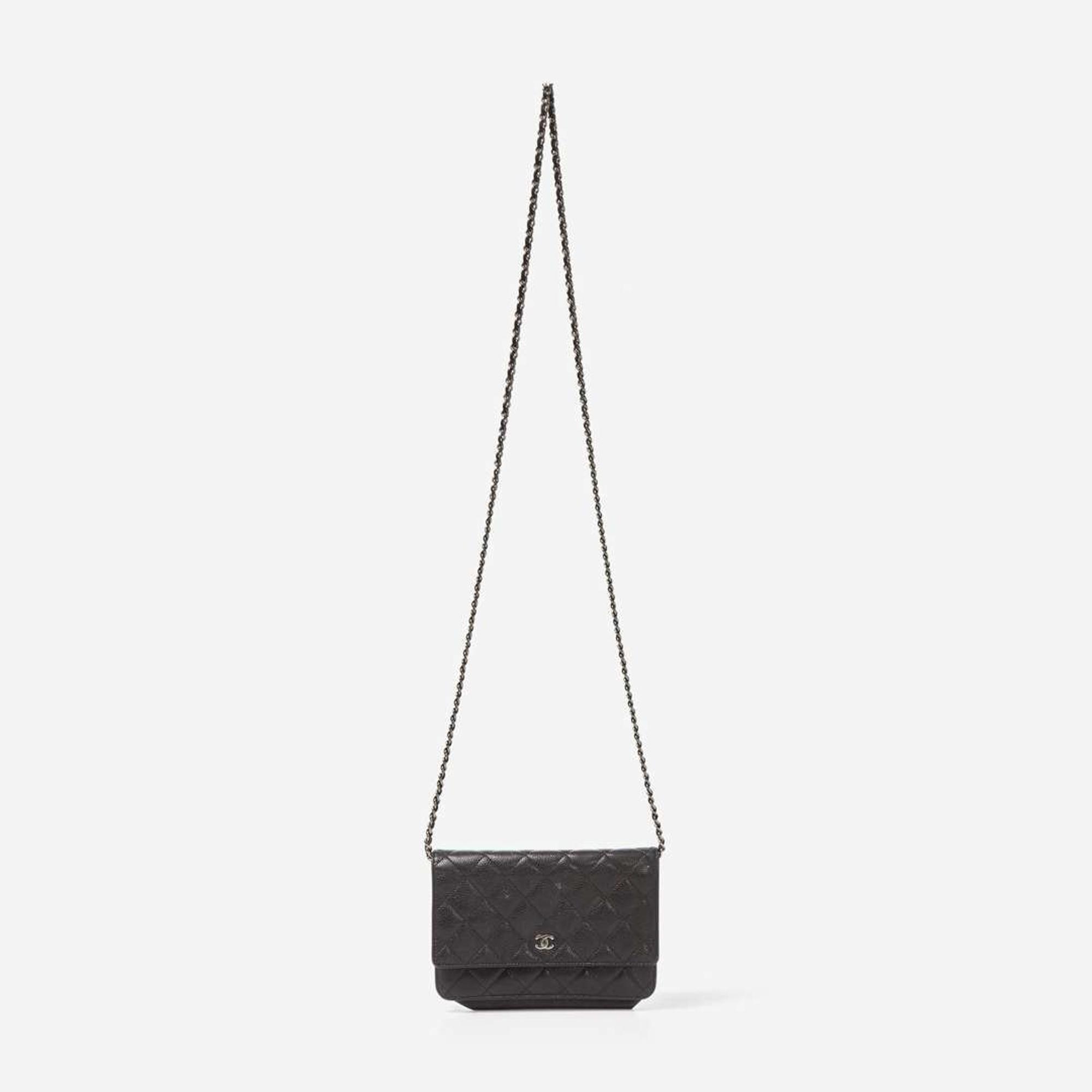 A Chanel Black Quilted Crossbody Purse Chanel
