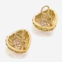 A pair of diamond and bicolor gold ear clips
