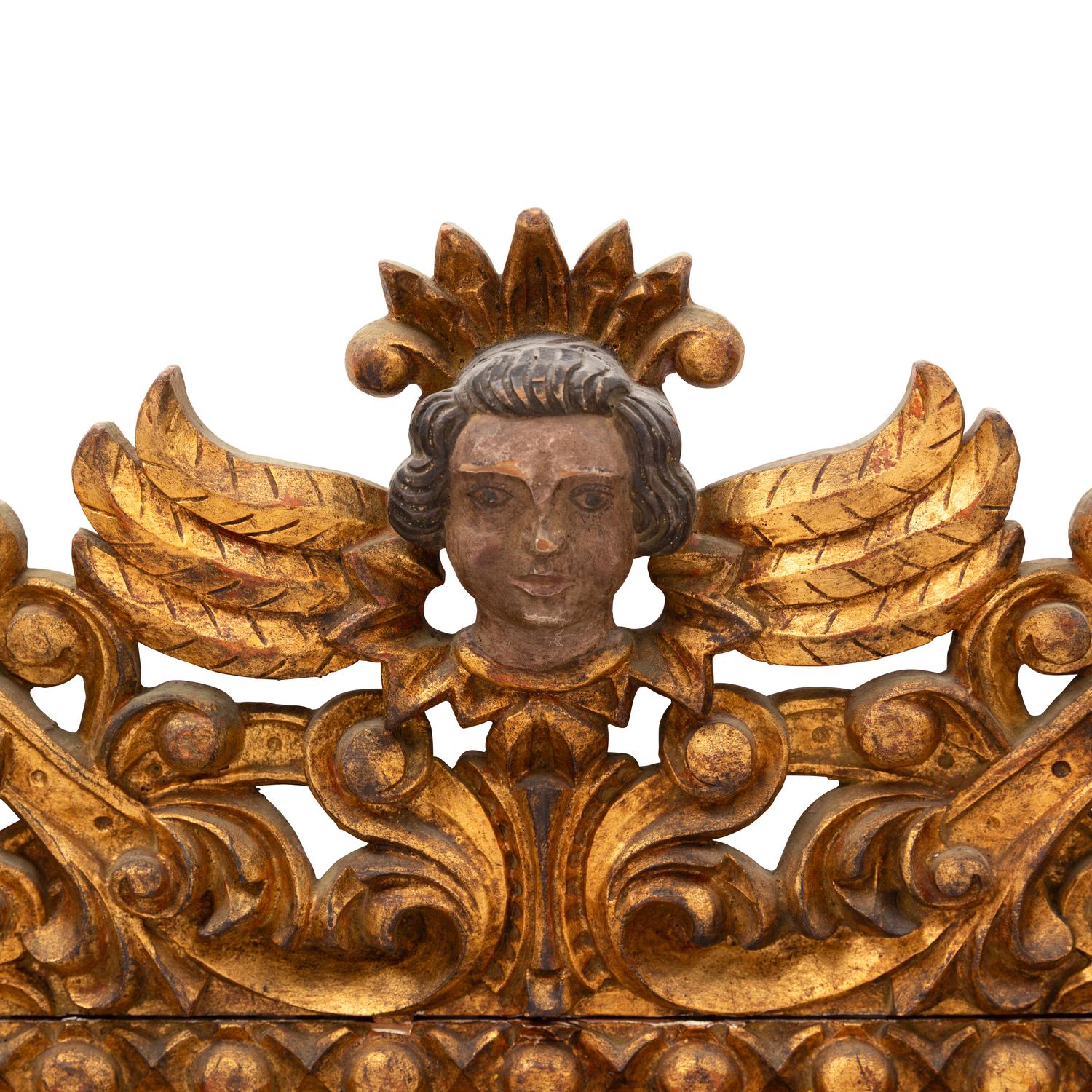 A Spanish Baroque Style Painted and Giltwood Mirror
