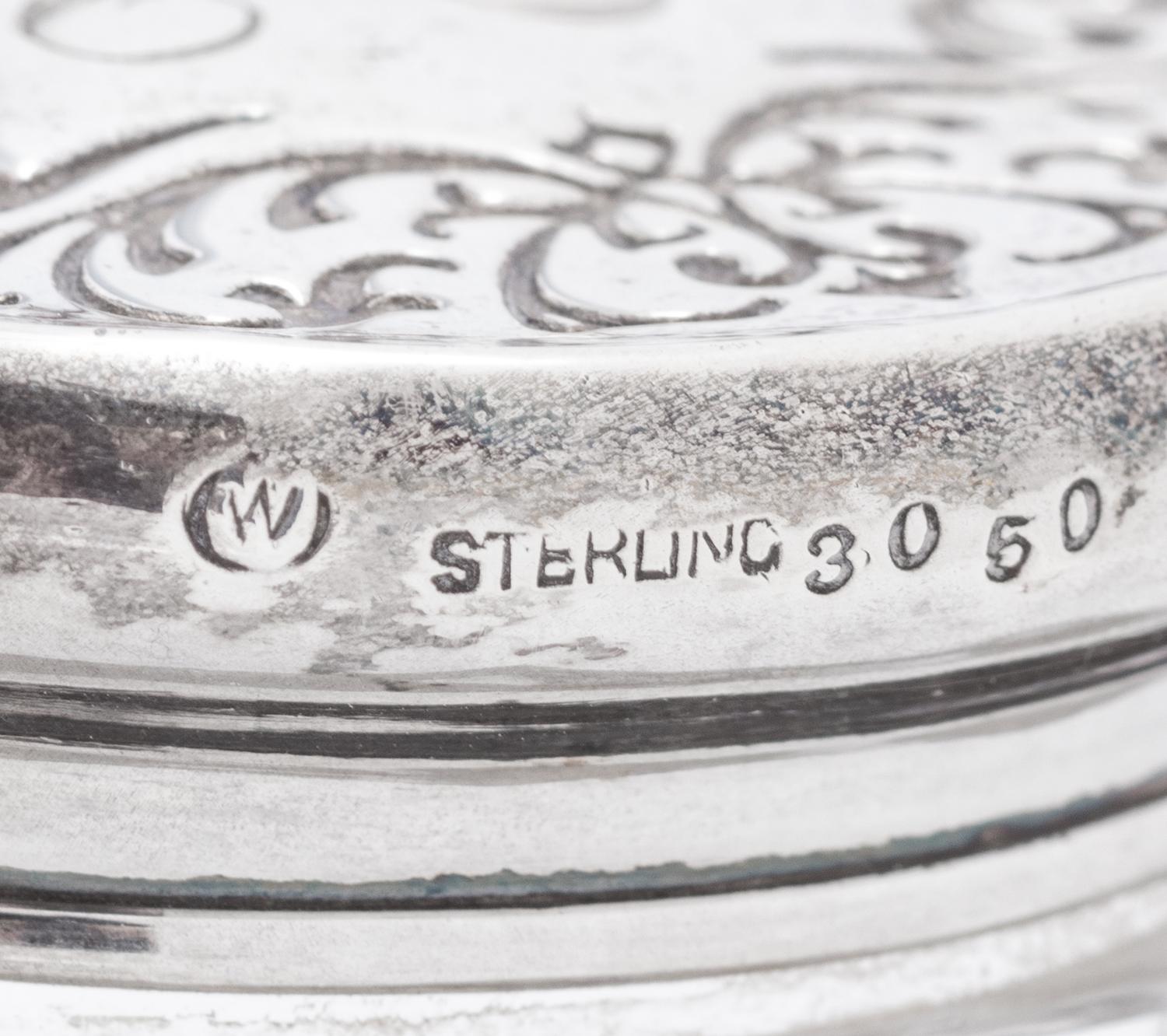 A Collection of Eight Silver Mounted Jars