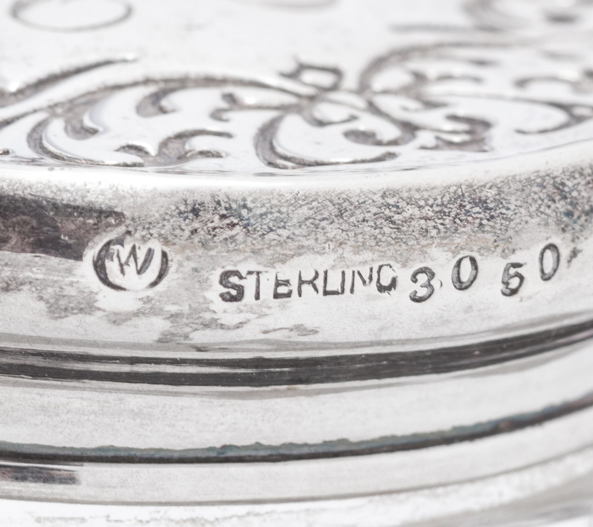 A Collection of Eight Silver Mounted Jars