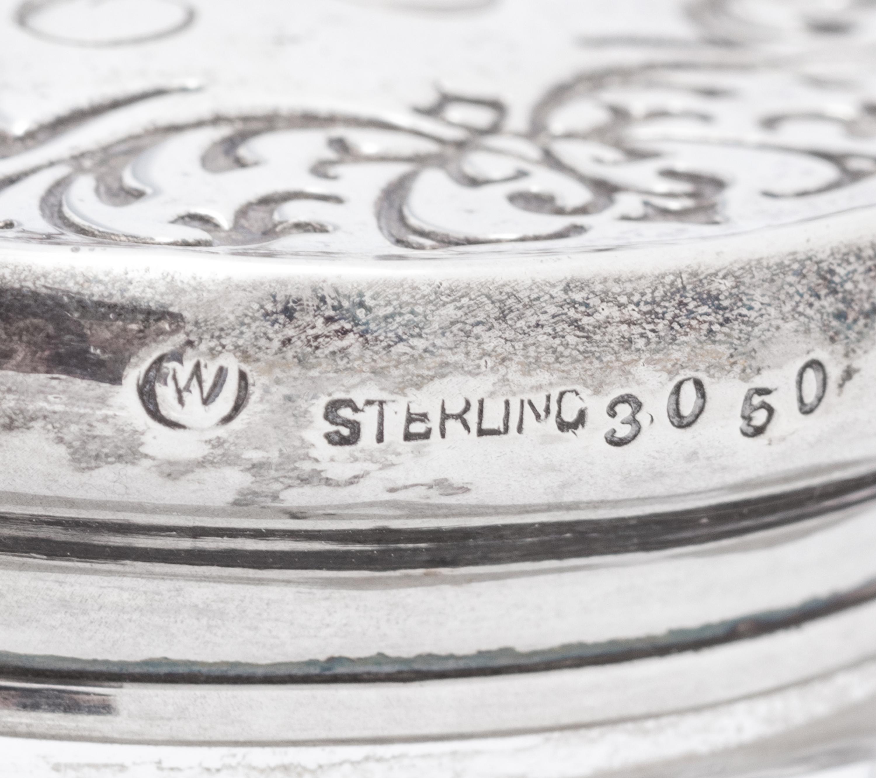 A Collection of Eight Silver Mounted Jars