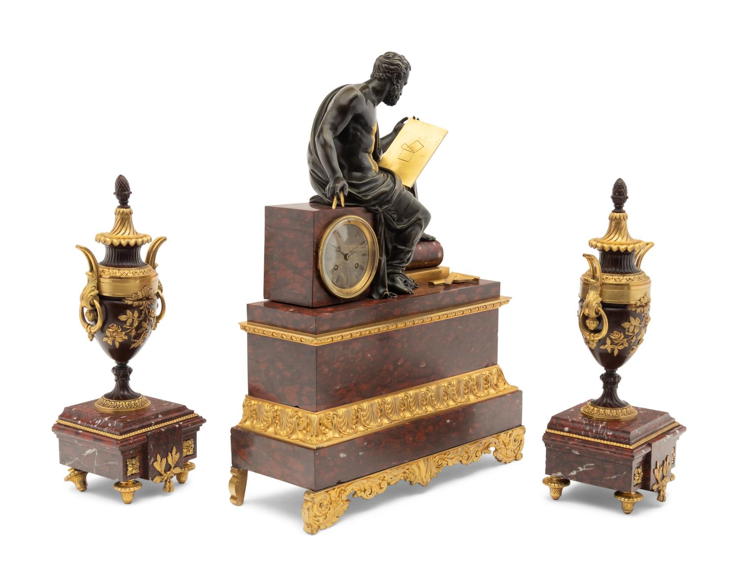 A Large French Gilt and Patinated Bronze and Marble Figural Clock Garniture