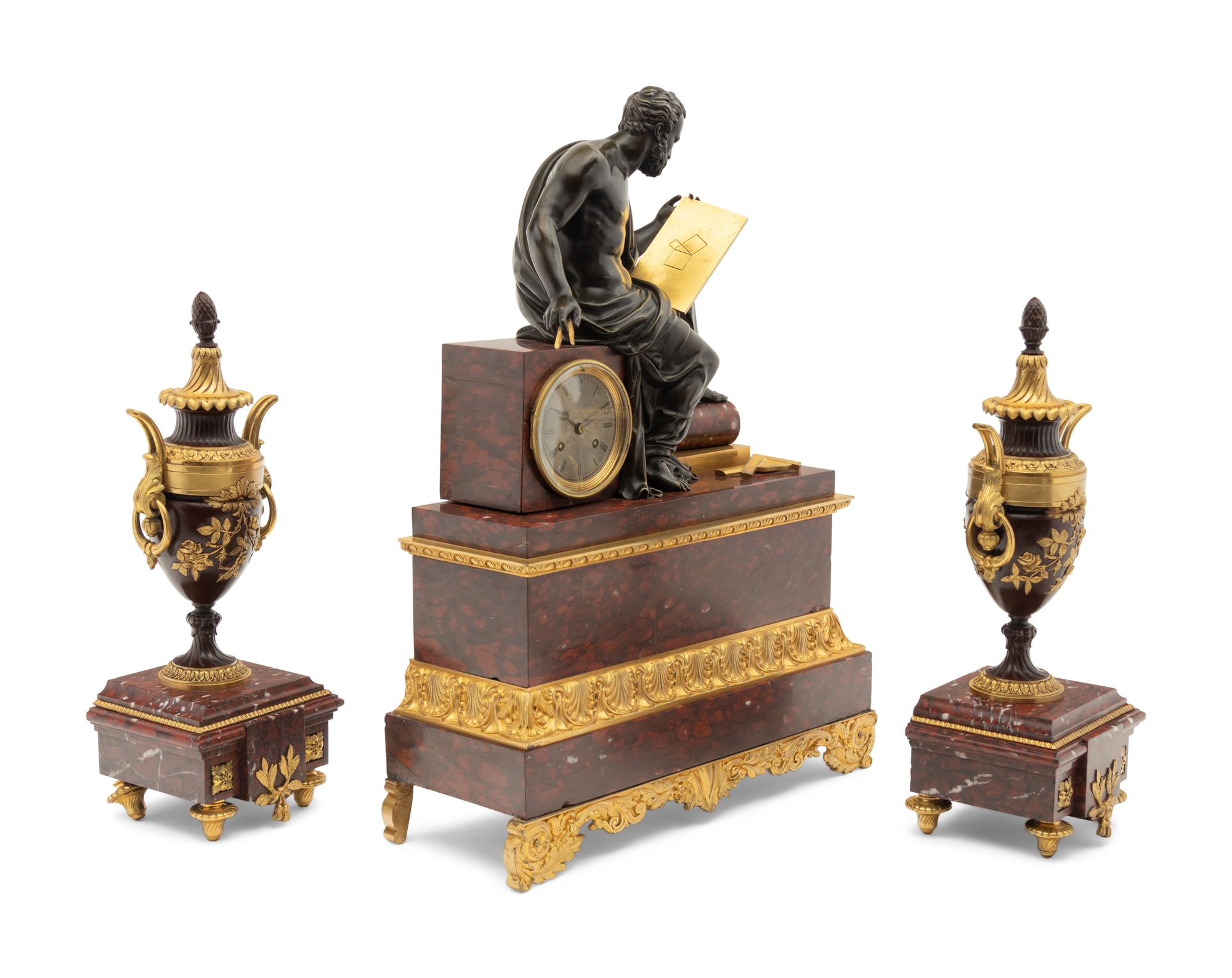 A Large French Gilt and Patinated Bronze and Marble Figural Clock Garniture
