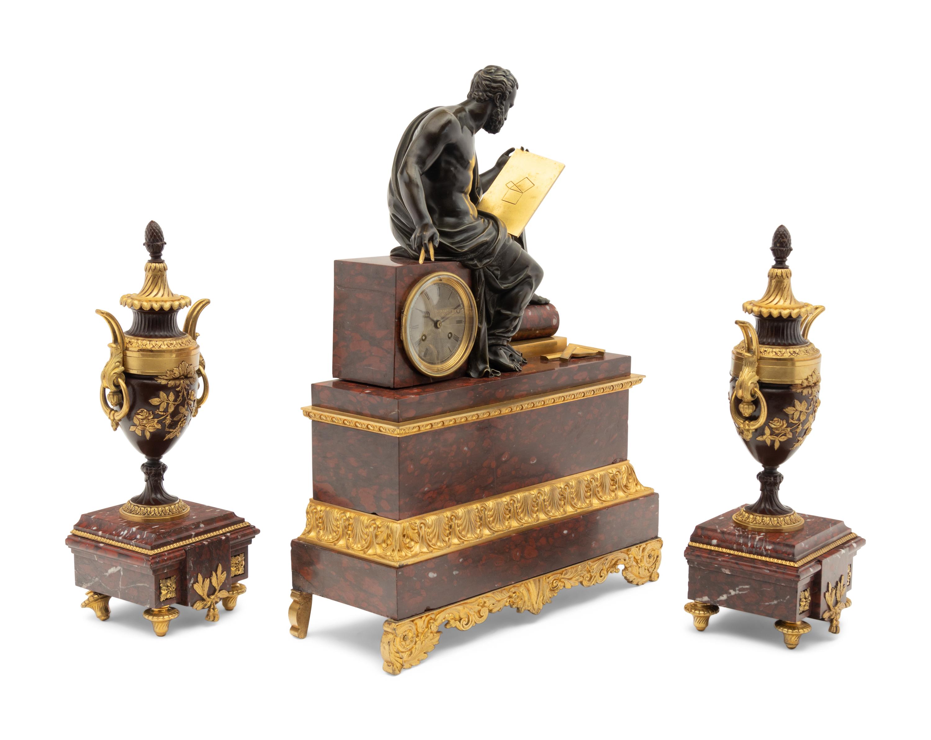 A Large French Gilt and Patinated Bronze and Marble Figural Clock Garniture