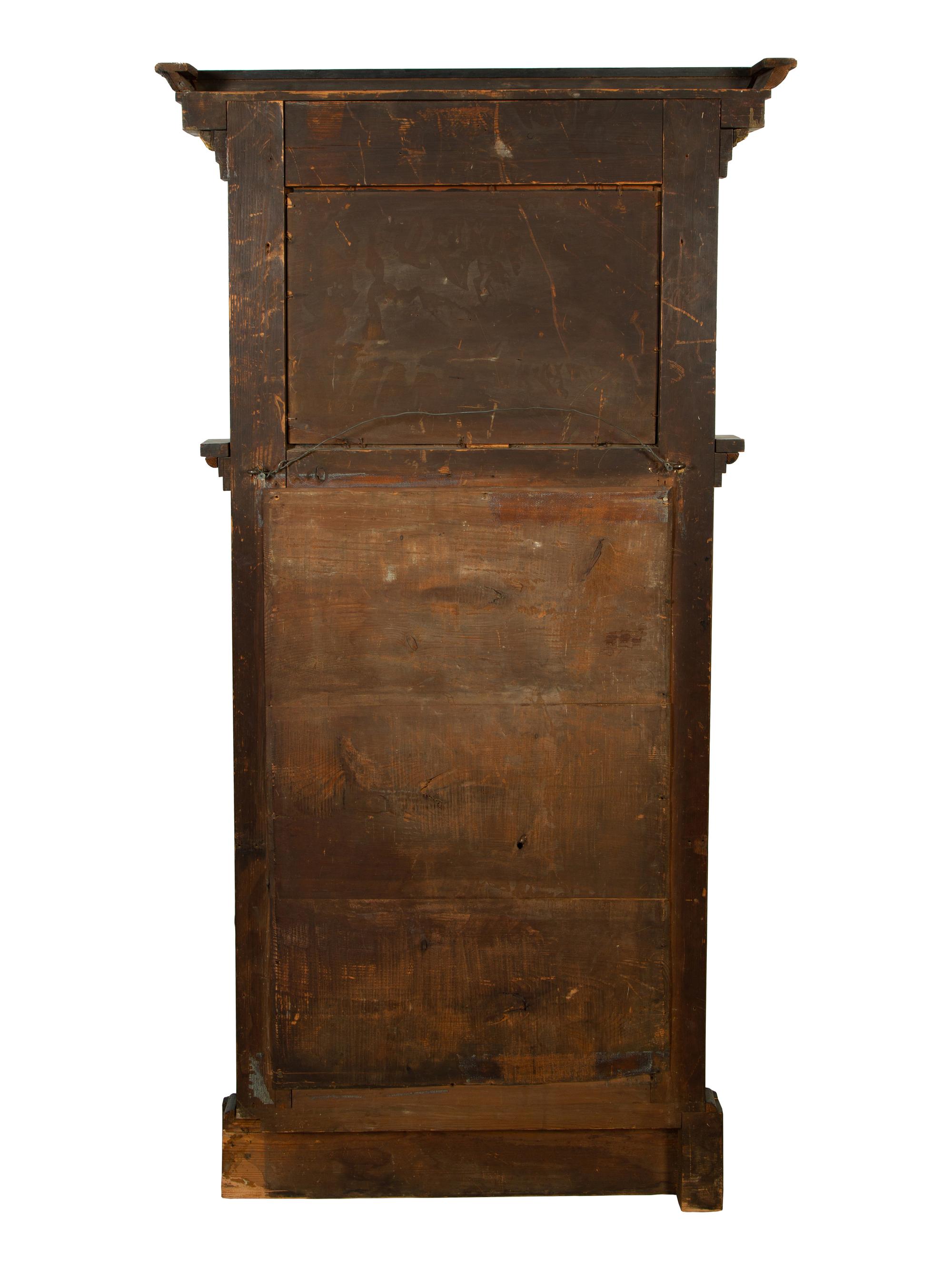 An Austrian Neoclassical Parcel Gilt and Ebonized Walnut Mirror