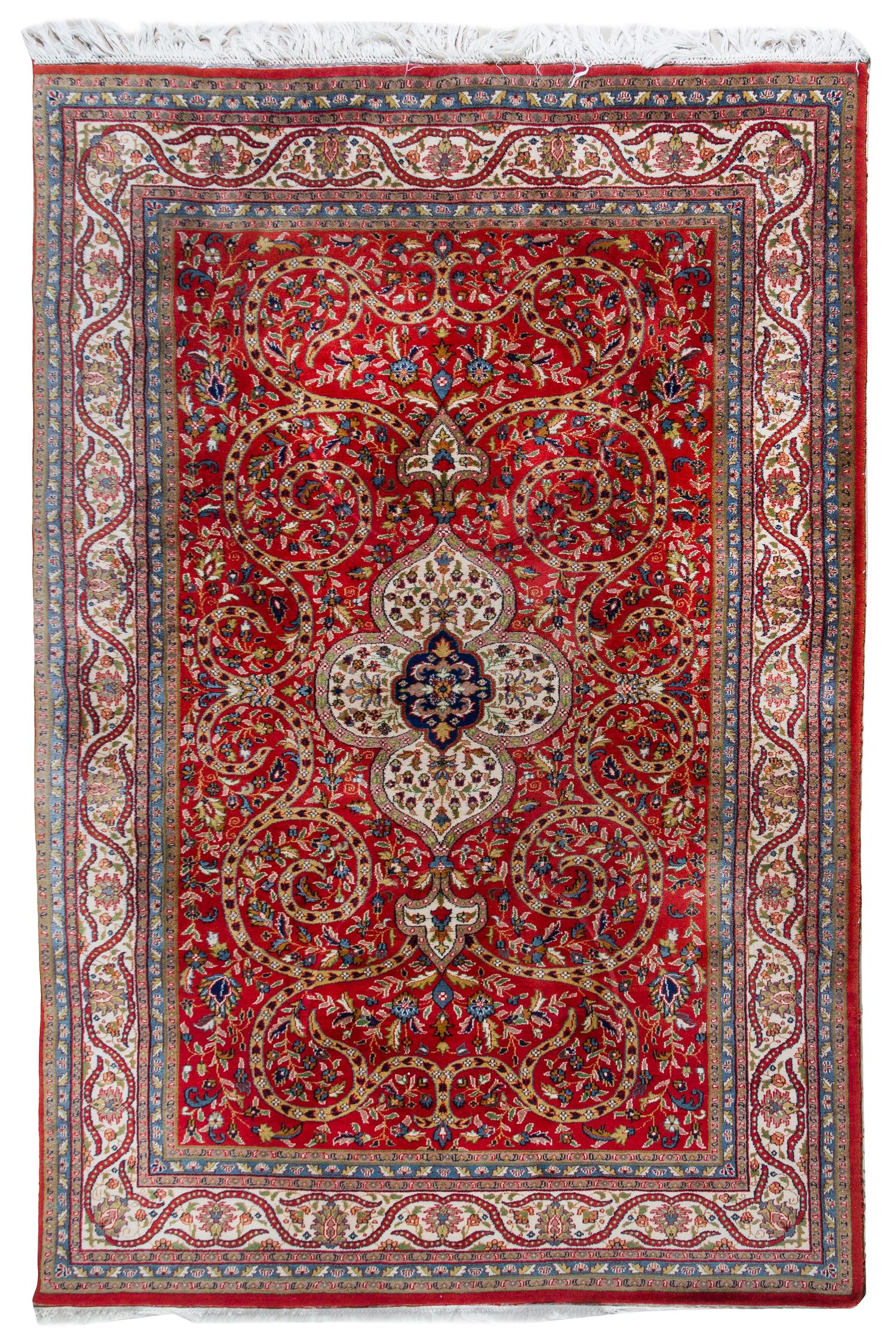 A Heriz Wool Rug 8 feet 11 inches x 5 feet 10 1/2 inches. — 20TH CENTURY