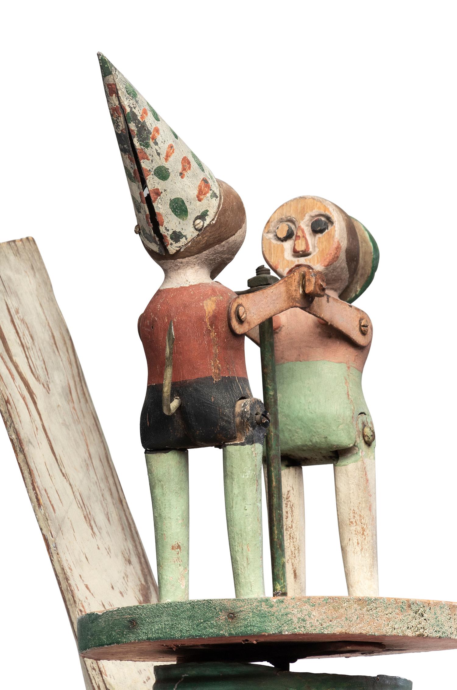 A Carved and Painted Wood Dancing Monkey Whirligig