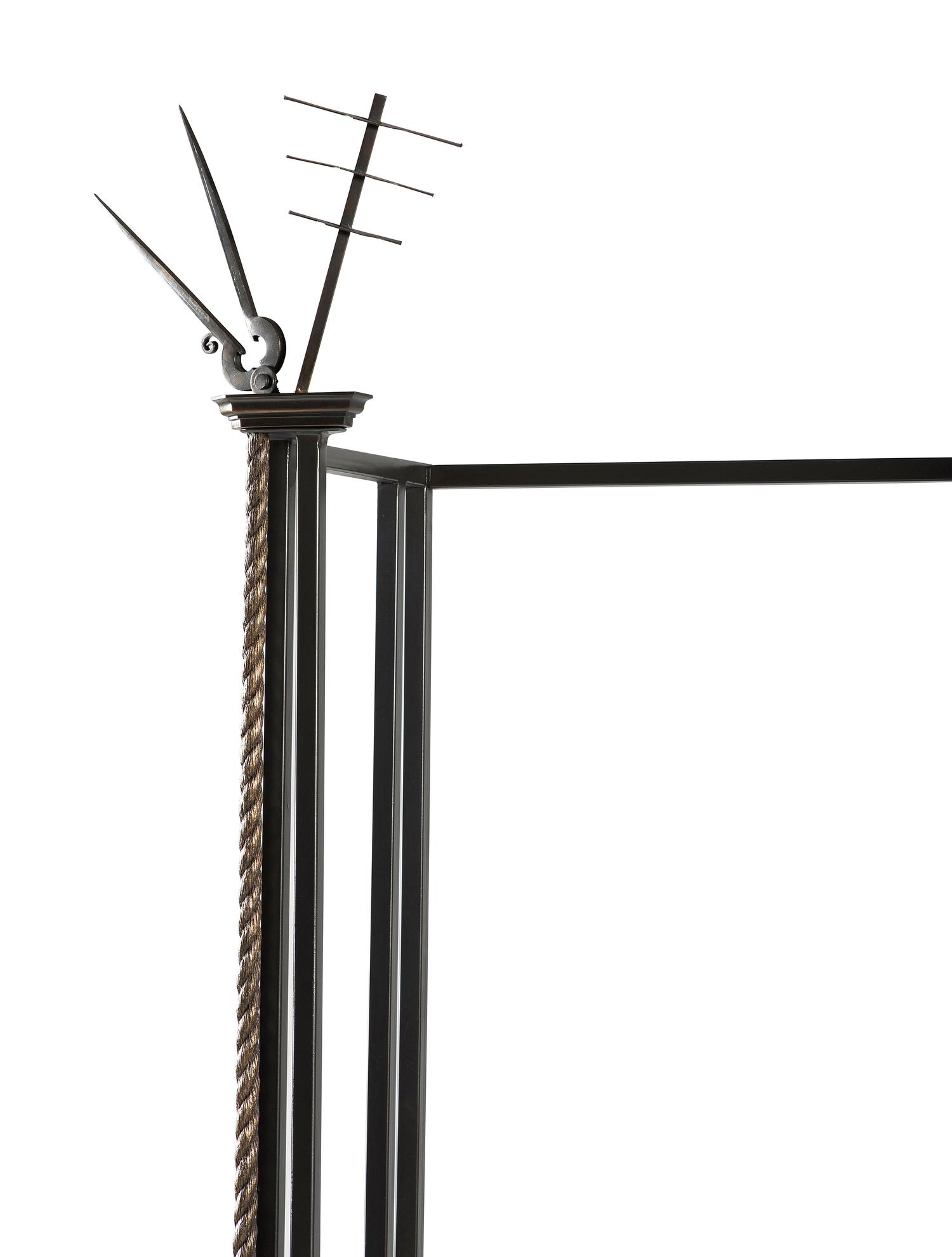 A Cast Iron and Bronze Nautical Themed Three-Tiered Bookshelf