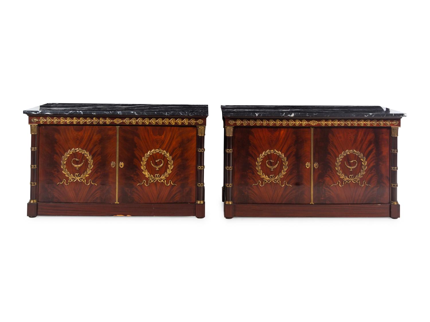 A Pair of Empire Style Gilt Bronze Mounted Mahogany Marble-Top Cabinets