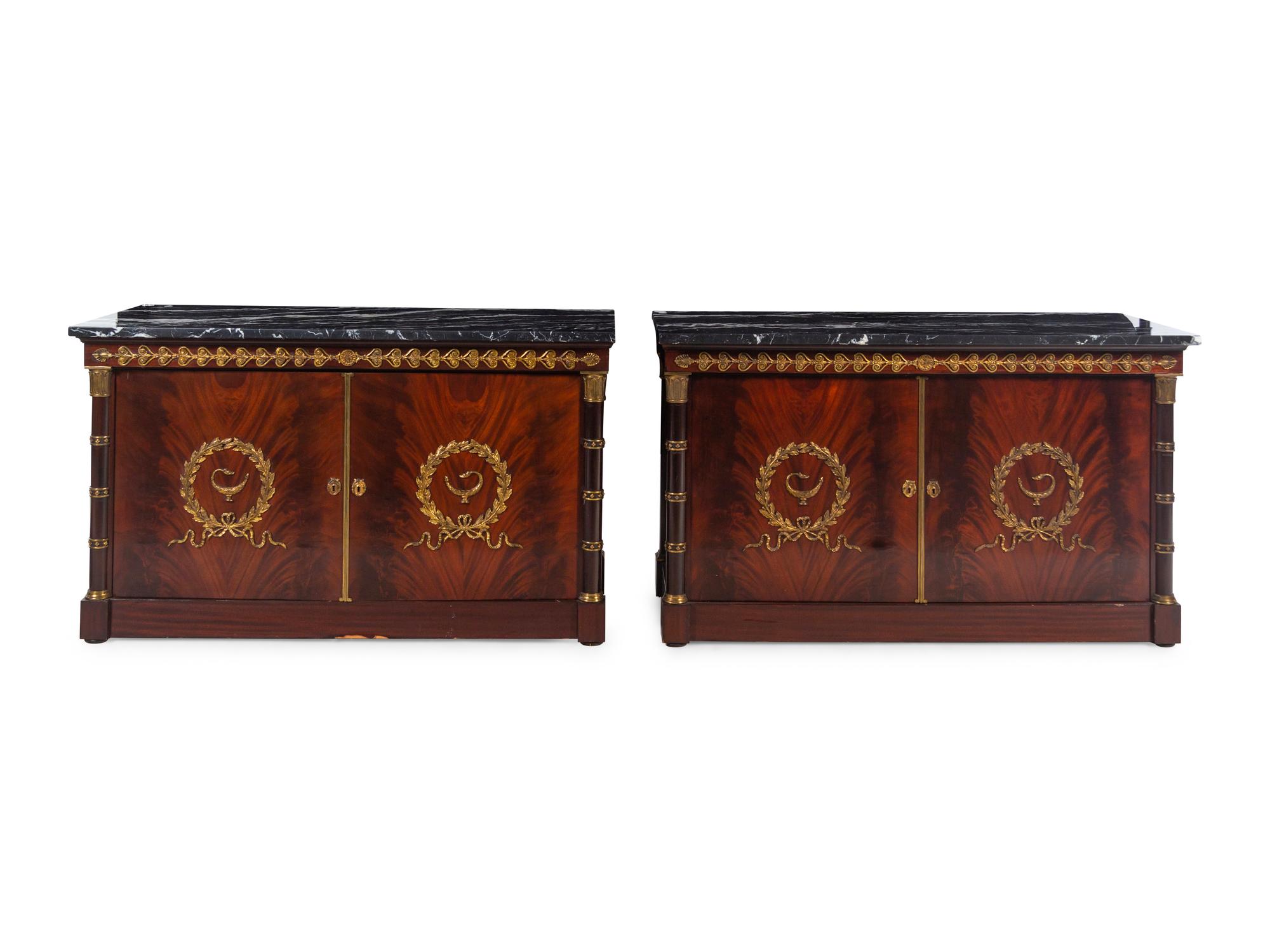A Pair of Empire Style Gilt Bronze Mounted Mahogany Marble-Top Cabinets