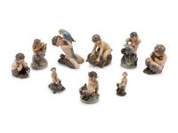 A Group of Nine Royal Copenhagen Porcelain Figures