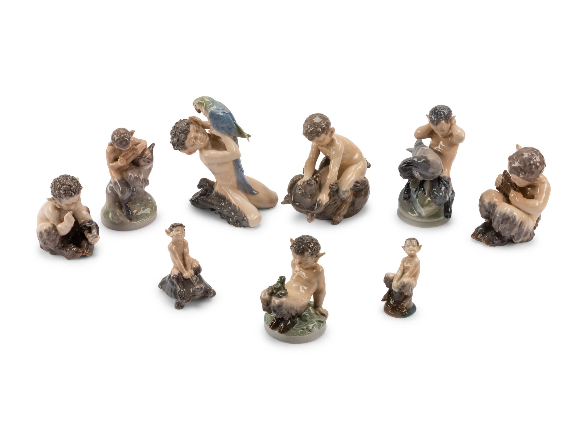A Group of Nine Royal Copenhagen Porcelain Figures