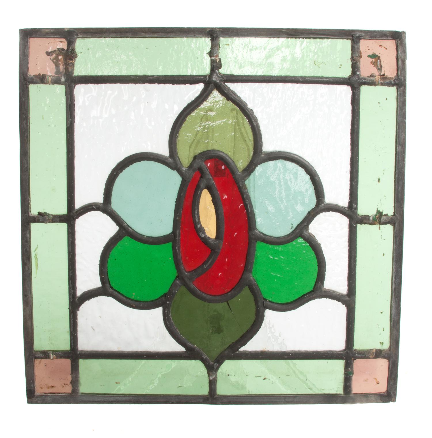 A Collection of Twelve Leaded Glass Windows Largest: 17 1/2 x 39 1/2 inches.
