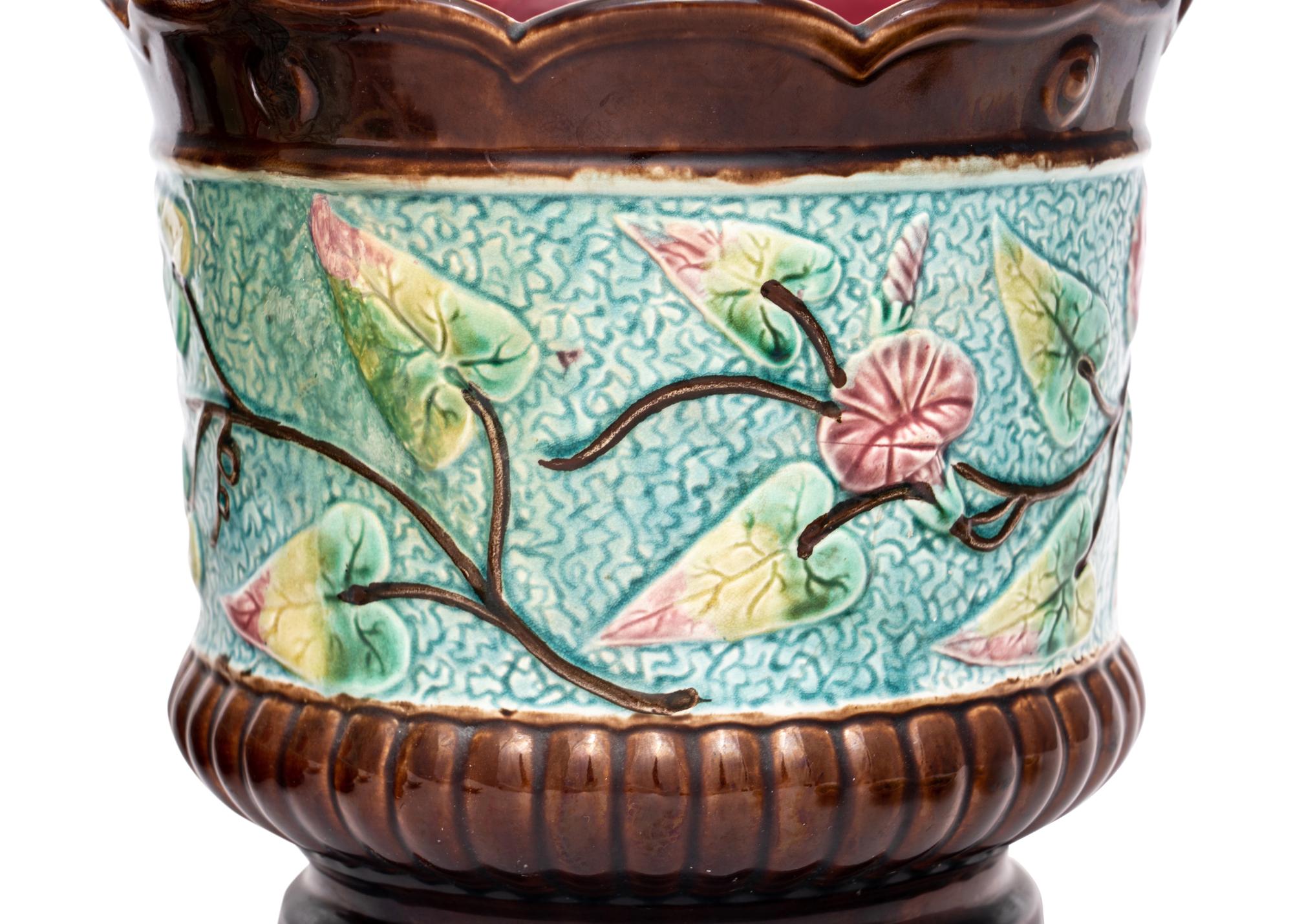 A Pair of Majolica Cache Pots and Two Majolica Leaf-Form Dishes