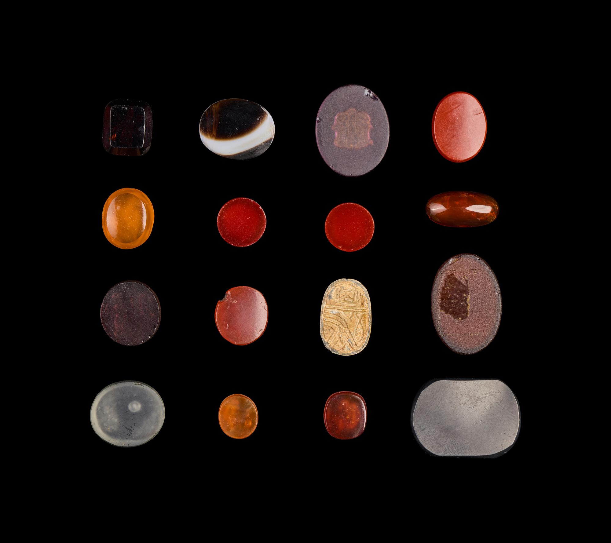 A Group of Sixteen Roman and Neoclassical Stone and Glass Intaglios