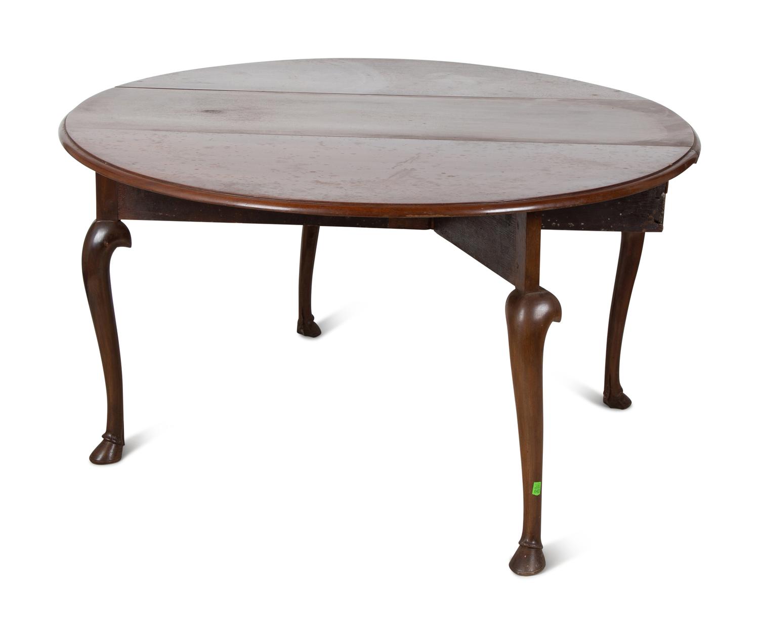 An George III Style Mahogany Drop Leaf Oval Dining Table
