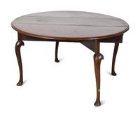 An George III Style Mahogany Drop Leaf Oval Dining Table