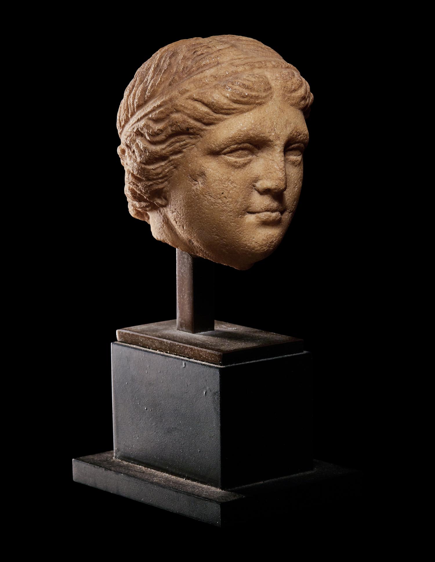 A Roman Marble Portrait Head of a Woman