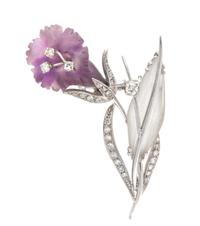 A Platinum, Diamond, Amethyst and Rock Crystal Floral Motif Brooch, 10.10 dwts.