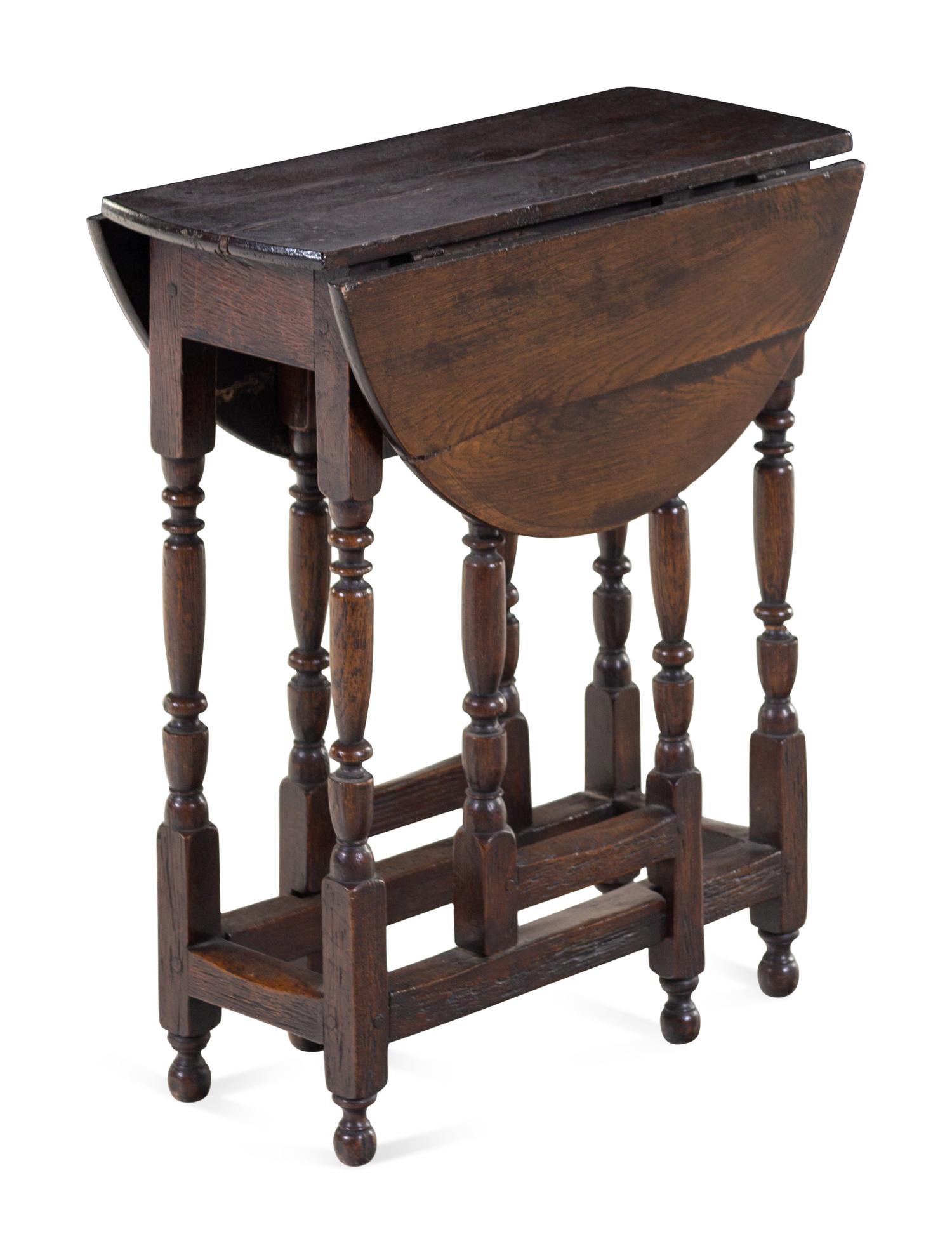 A Jacobean Turned Oak Gate-Leg Low Table