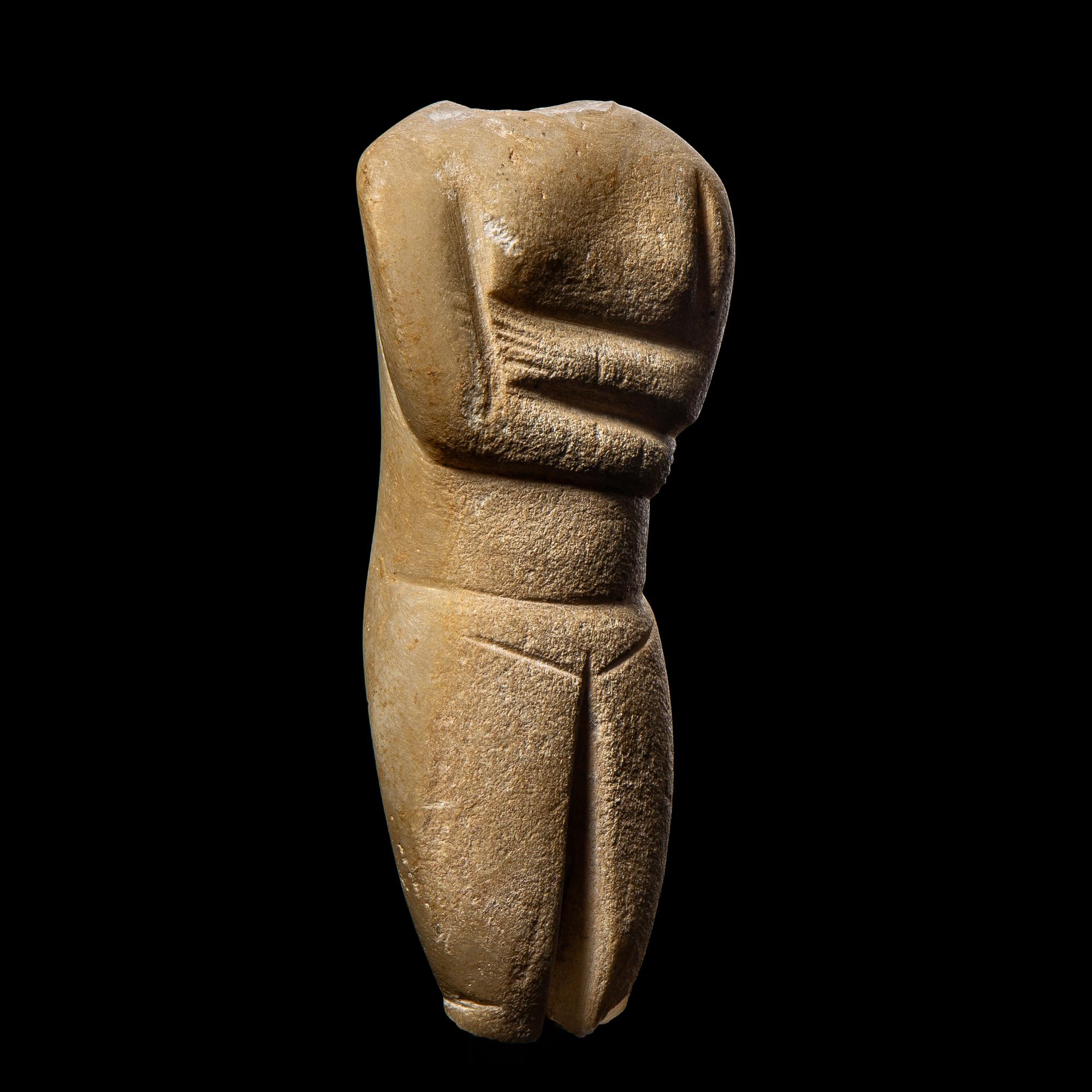 A Cycladic Marble Female Torso