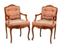 A Pair of Louis XV Style Oak Fauteuils