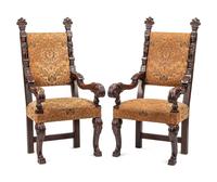 A Pair of Flemish Baroque Style Carved Walnut Armchairs