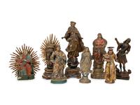 A Group of Eight Carved and Polychromed Santos Figures