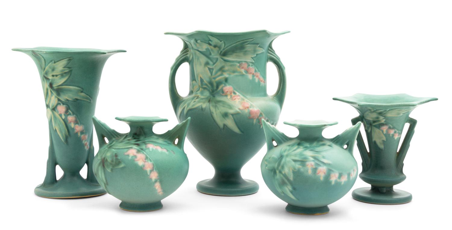 Five Roseville Bleeding Heart Pottery Vases Height of tallest 8 1/2 inches.