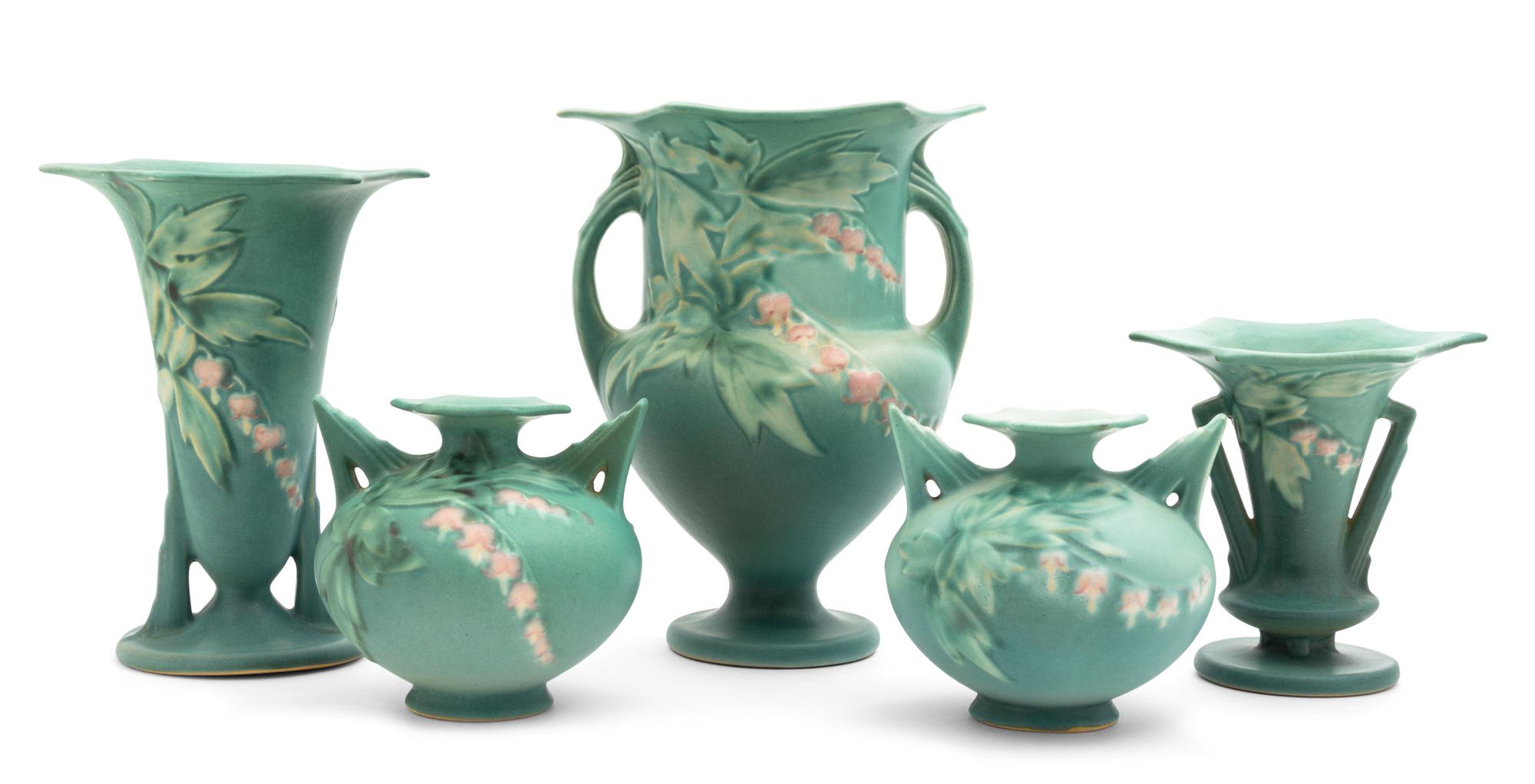 Five Roseville Bleeding Heart Pottery Vases Height of tallest 8 1/2 inches.