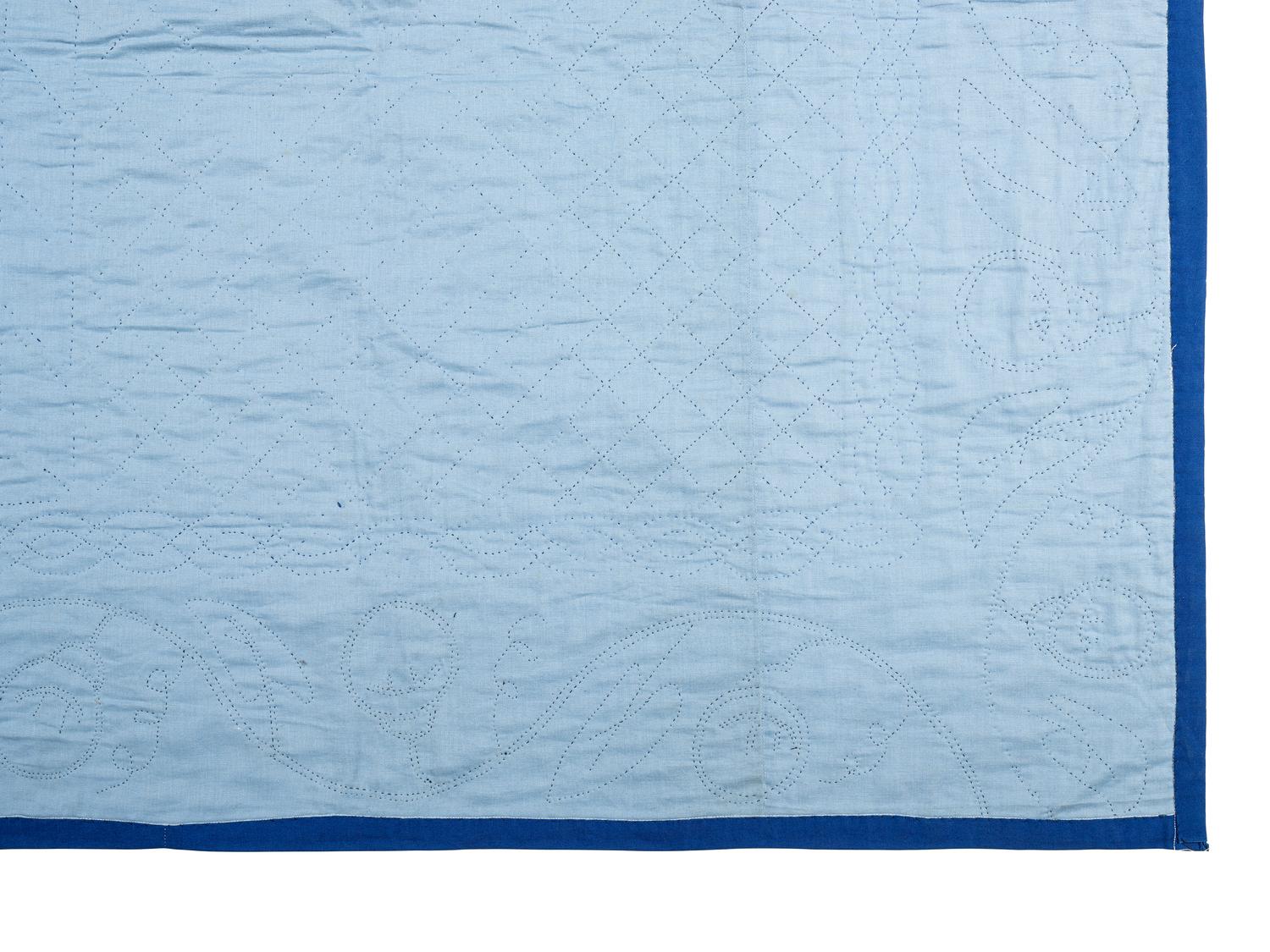 An Amish Eight Point Star Pieced Cotton and Satin Quilt