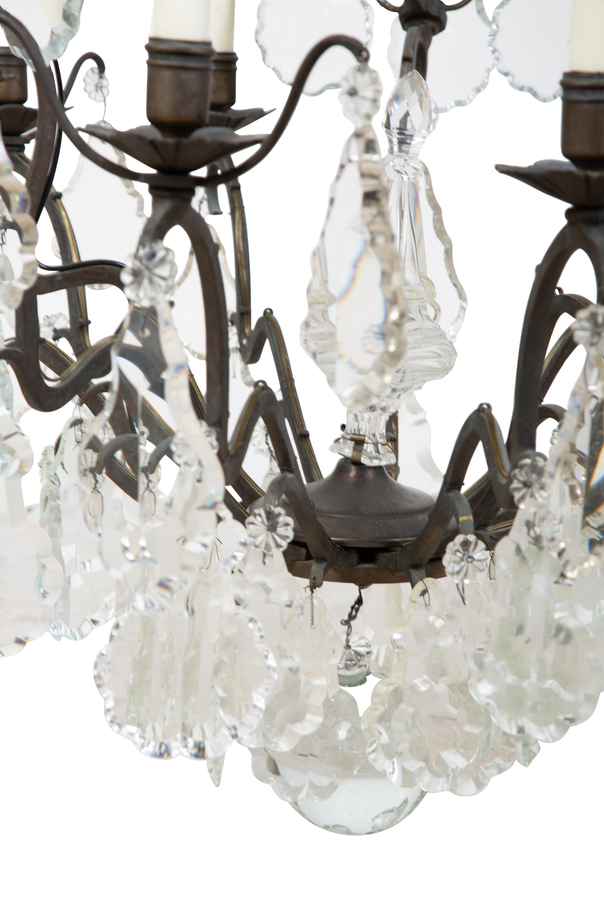 A Louis XV Style Bronze and Glass Nine-Light Chandelier — EARLY 20TH CENTURY