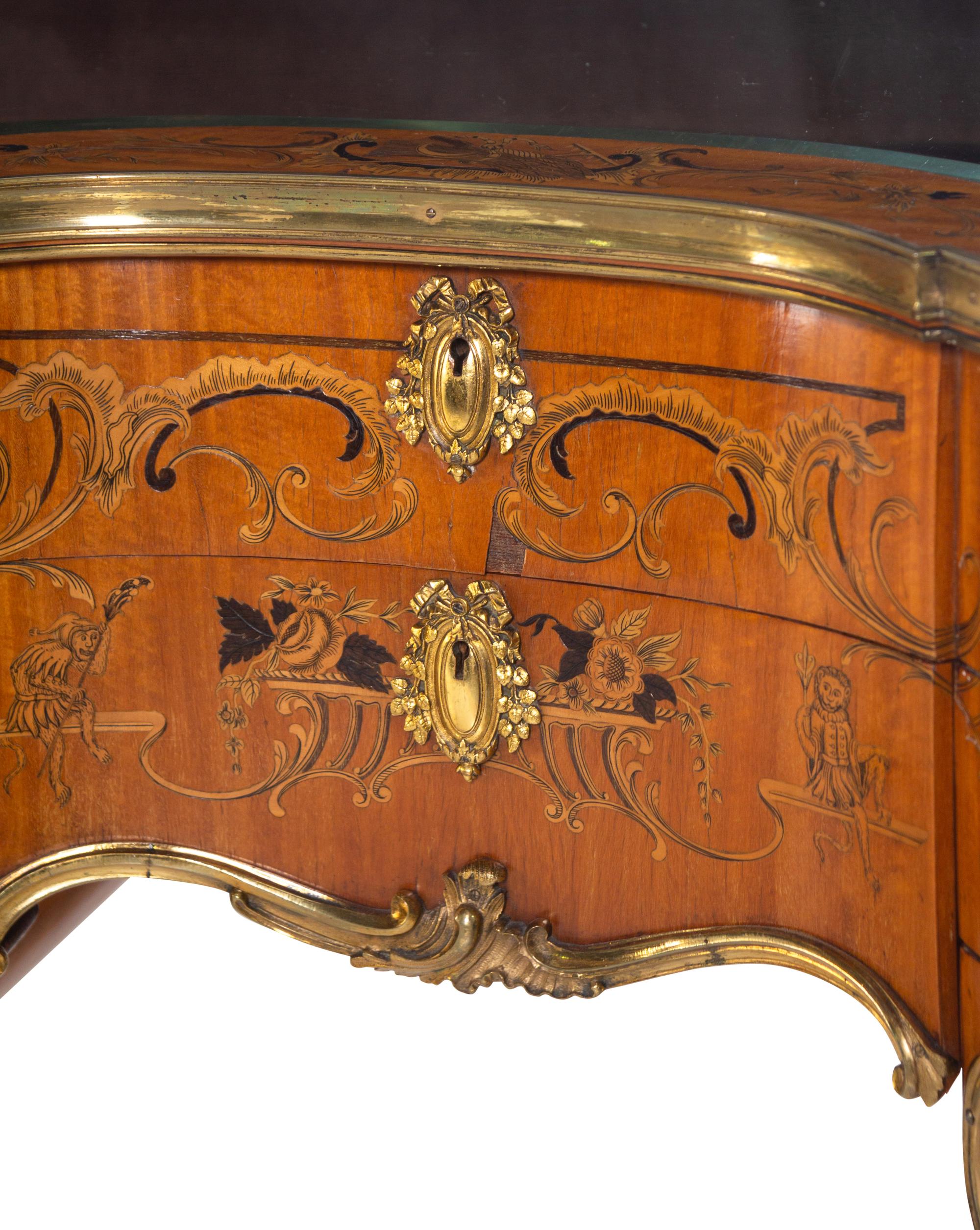 A Louis XV Style Gilt Bronze Mounted Penwork and Marquetry Vitrine Commode