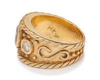 A 14 Karat Yellow Gold and Diamond Ring,